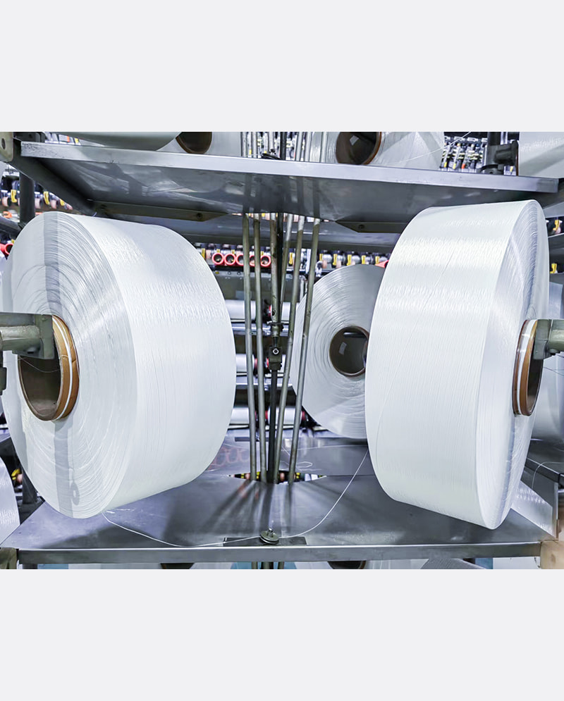 Wat zijn de brede toepassingen van volledig getrokken garen in de mode- en industriële sector?